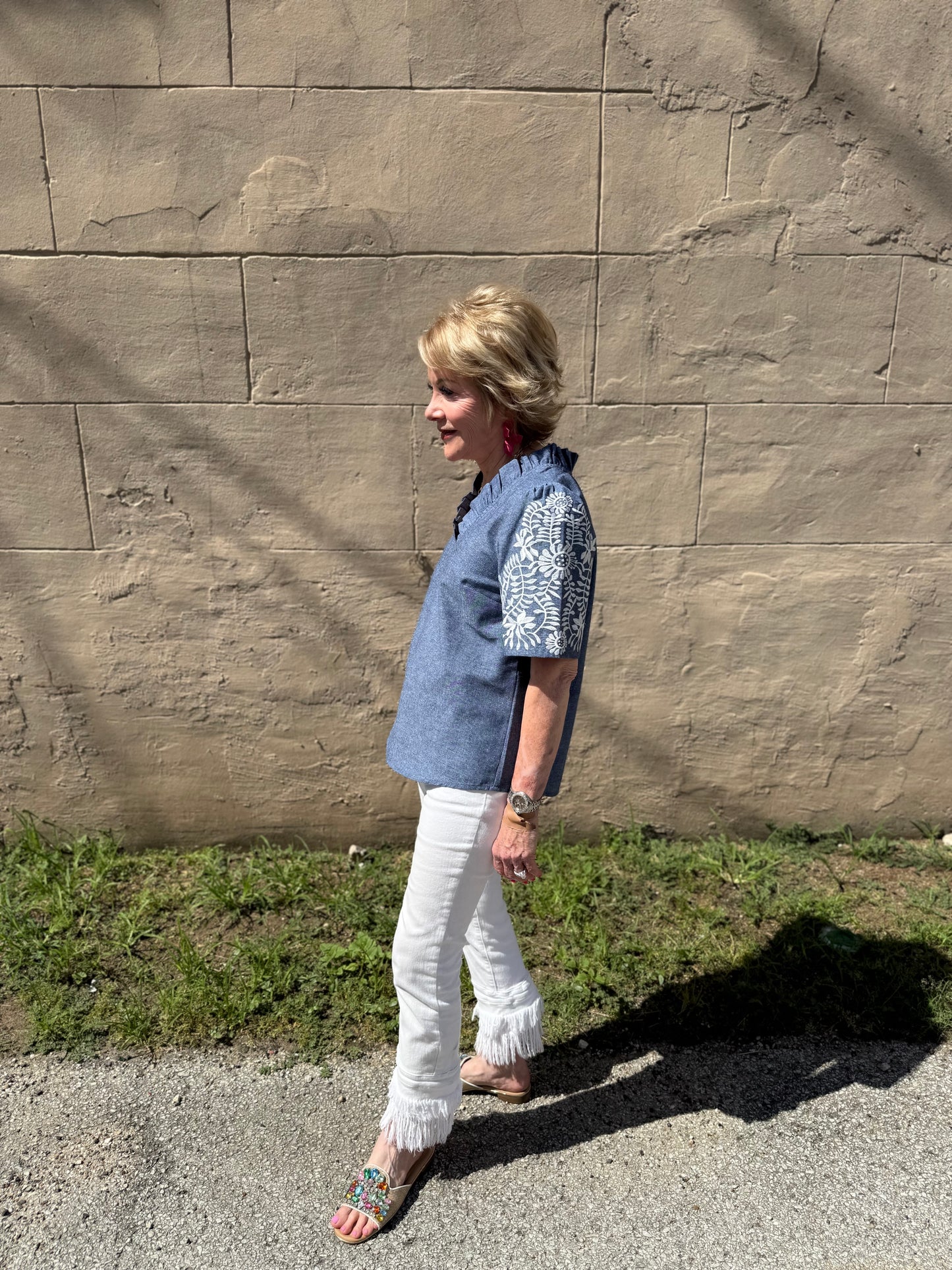 Denim Floral Top in sizes XS-XL, features floral pattern on denim fabric.