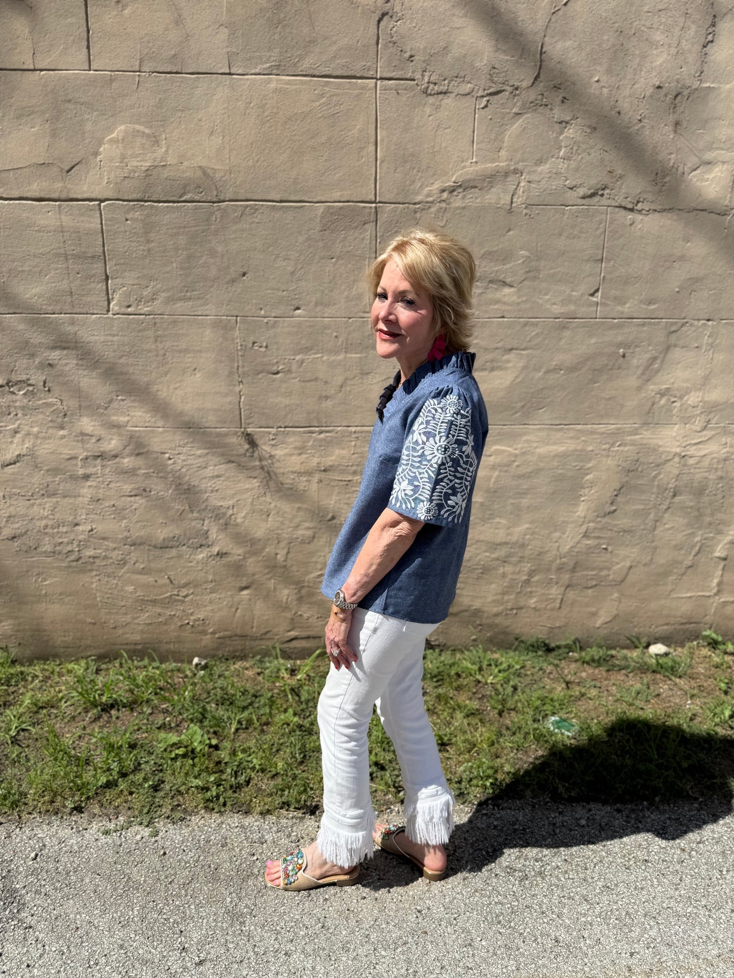 Denim Floral Top with patterned sleeves, available in sizes S-XL.