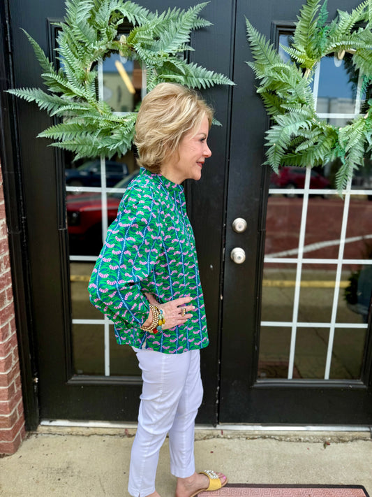 Lia Top: green patterned, 3/4 puff sleeves. Available in sizes XS–XL.