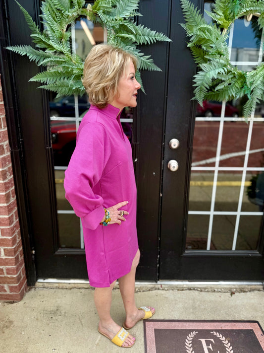 Hadley Crocus Pink Dress, available in sizes XS-XL. Features a relaxed fit and mid-length silhouette.