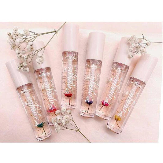 Six transparent perfume bottles with white caps, each containing a small, colorful flower. Available sizes: Not specified.