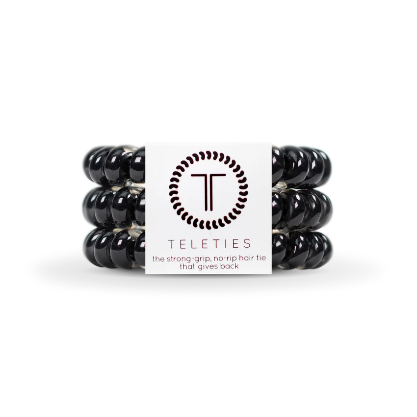 Three black coiled hair ties by TELETIES offer a stylish, strong-grip, no-rip solution. Available in small and large sizes.