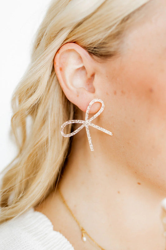 Lola Bow Earrings: Glittery, crafted from surgical-grade stainless steel. Sizes available: Small, Medium, Large. Ideal for sensitive ears.