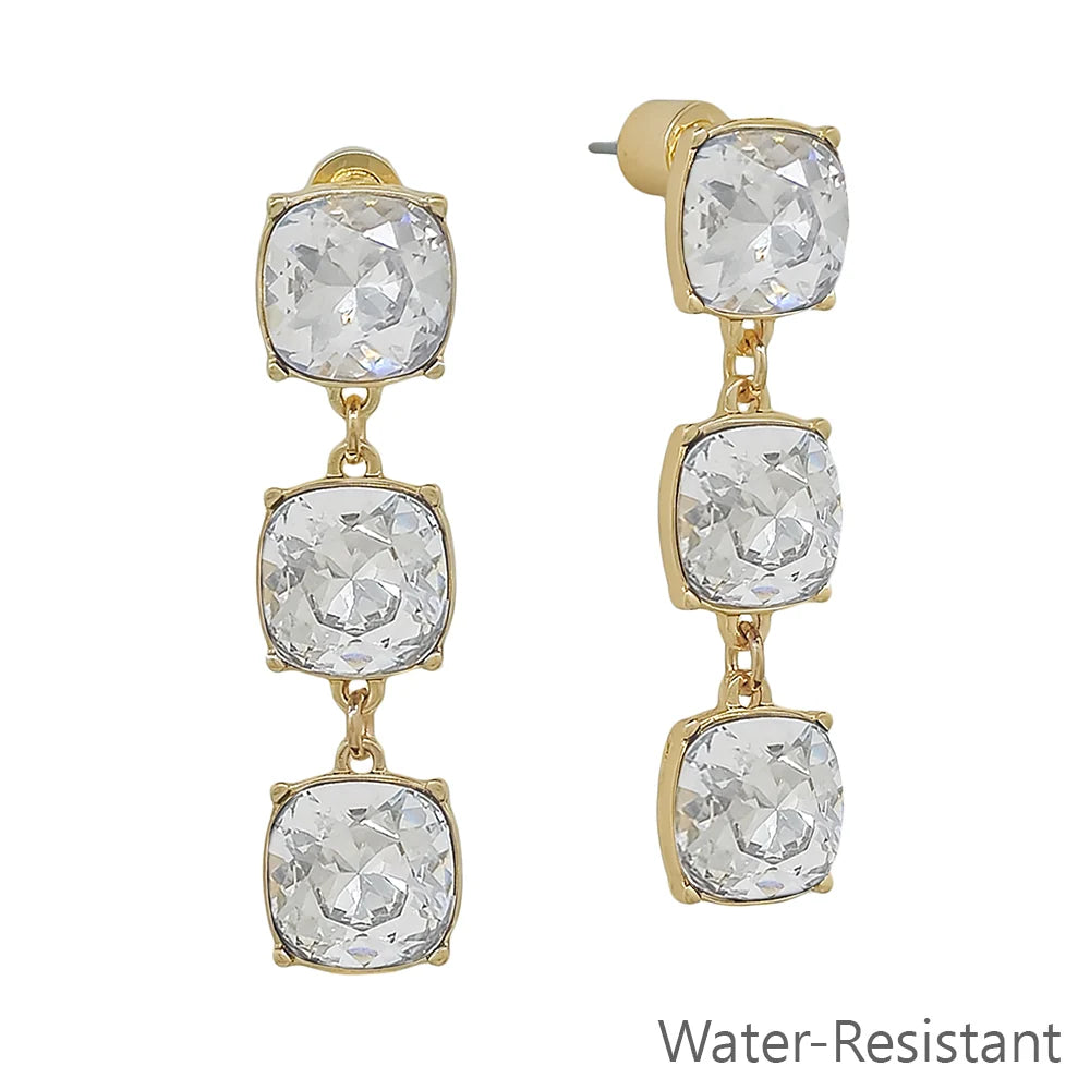 Pryn Clear Crystal Post Earrings: gold-tone dangle earrings with three stacked square clear crystals. Water-resistant. Available sizes: not specified.