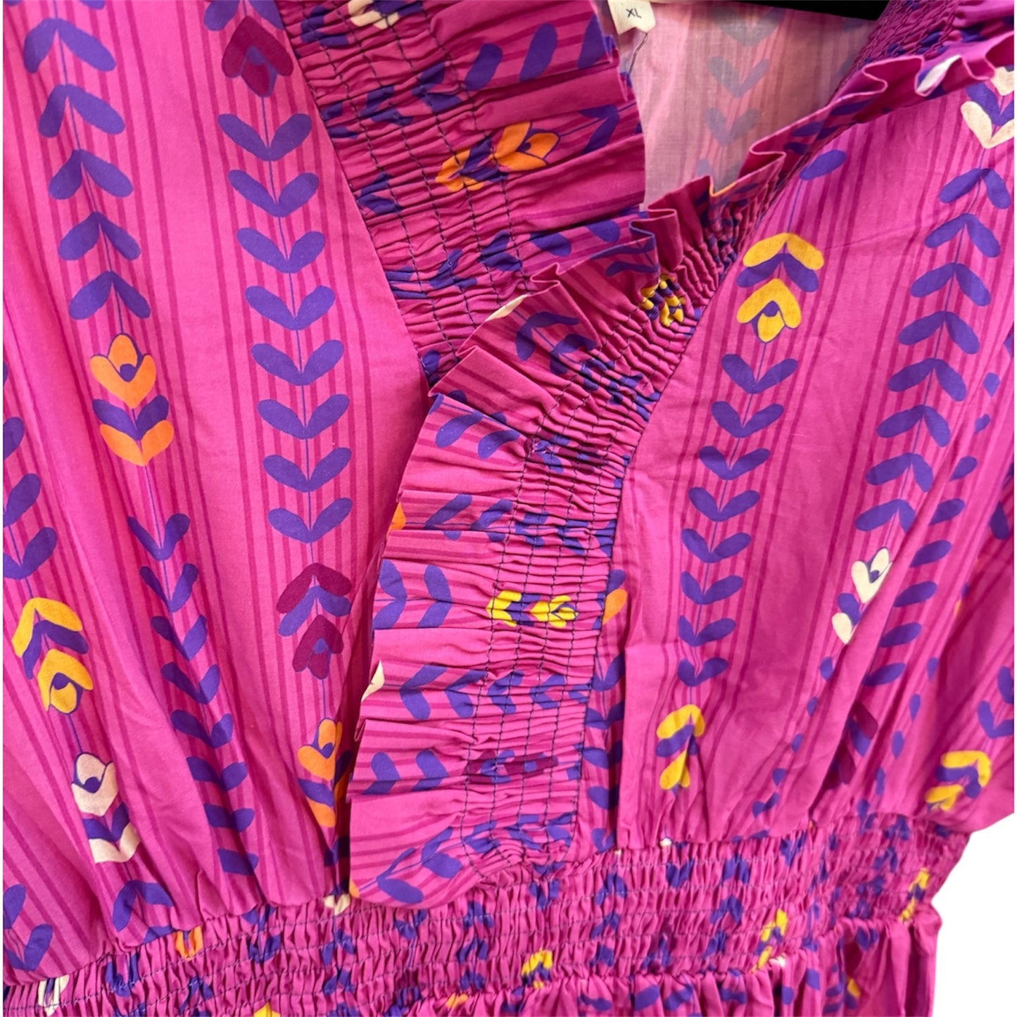 Magenta Garden Midi Dress: pink with purple/yellow leaf prints, ruched neckline/waistband, ruffled collar. Sizes XS-XL.