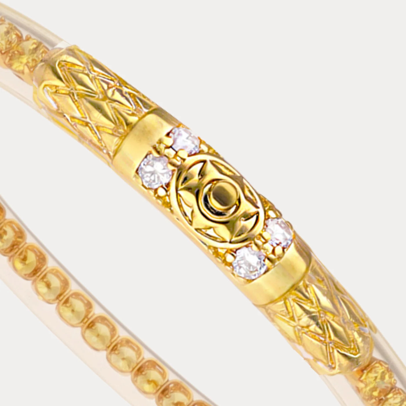 Queen All Weather Bangles® in Yellow Rose & Gold with lattice patterns, four round gems, and engraved oval; sizes S/M/L/XL.