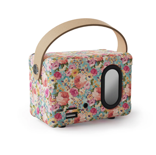 Floral Vintage Speaker with colorful floral pattern, beige handle on top, black speaker on front right side, USB port at bottom left. Retro vibe with Bluetooth. Available in sizes: Medium and Large.