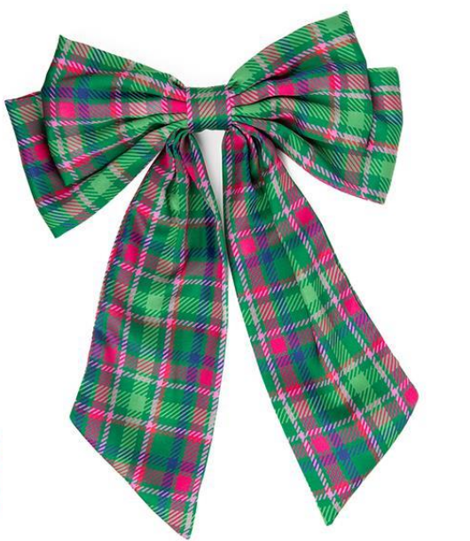 The Holiday Bows feature a large, colorful design with a plaid pattern in shades of green, pink, and blue. Showcasing wide loops and long, tapering tails crafted from soft fabric with a woven texture. Sizes available: 12 inches, 18 inches.