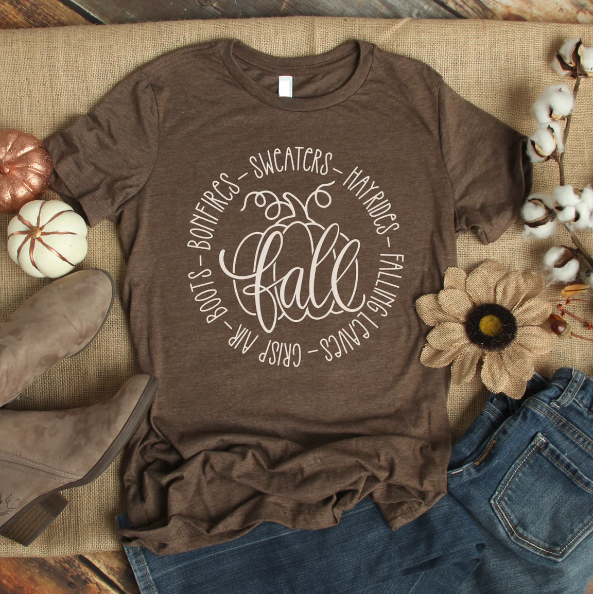 Brown “Fall Sweaters Hayrides” graphic tee; available in sizes S–XL.