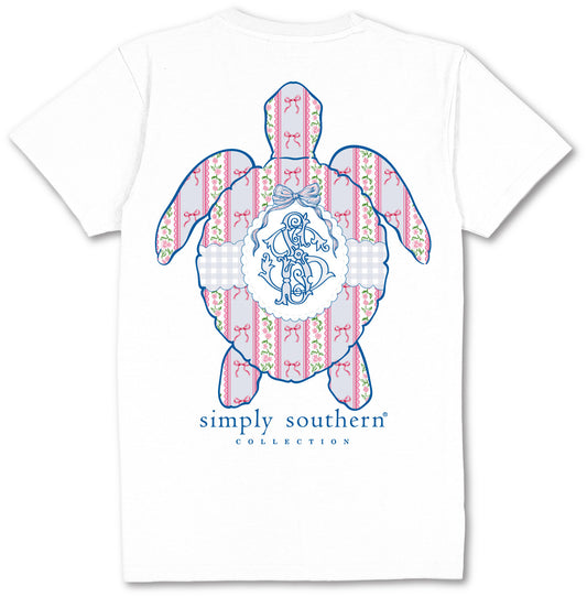 White Simply Southern Coquette Logo Turtle T-Shirt with pink/blue sea turtle graphic, monogram, text. Sizes: S-XXL.