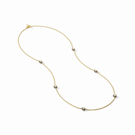 Delicate gold-plated necklace with round bezel-set white gemstones. Available in multiple sizes.