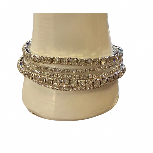 Three sparkling Mica stretch bracelets with crystal stones. Sizes available: S, M, L.