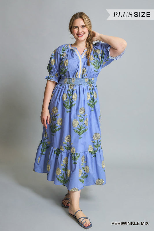 Avery Floral Smocked Midi Dress in Periwinkle Mix. Features short puff sleeves, smocked bodice, relaxed fit. Available in plus sizes 1X-4X.