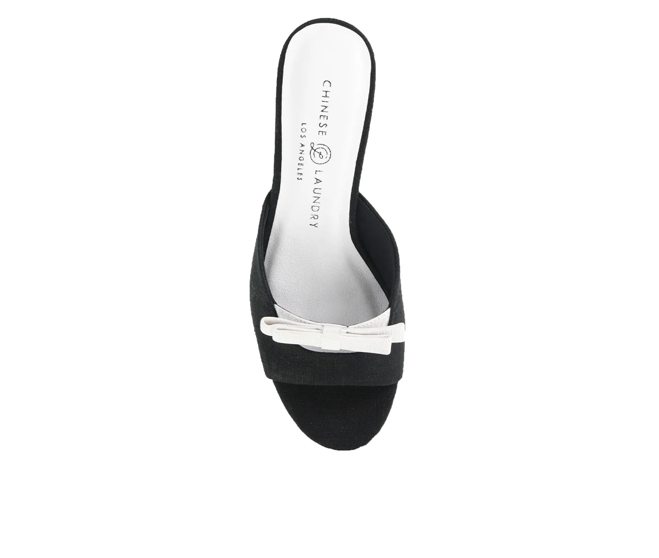 The Yolana Heel - Black/White: Stylish black slip-on with a white bow accent, thin sole. Sizes available: 6-10.
