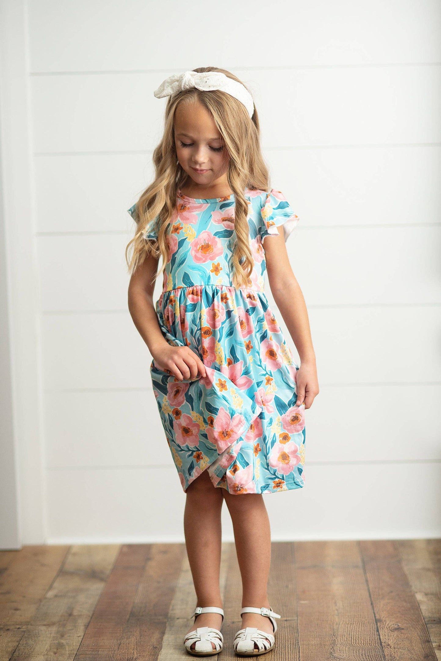 Girls Claire Pink Floral Print Twirl Dress. Available in sizes 2T-10Y.