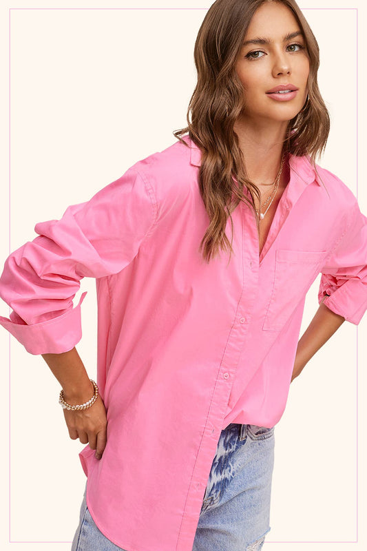 Bright pink Carnation Classic Collared Button Down Poplin Shirt, oversized with rolled sleeves; sizes XS-XL available.