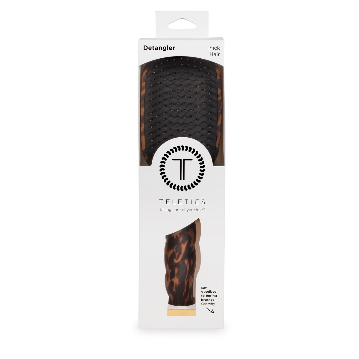 Detangler Hair Brush for Thick Hair - Tortoise, packaged in a white box labeled “TELETIES Detangler,” with the tortoiseshell brush visible through a clear window. Available in multiple sizes.