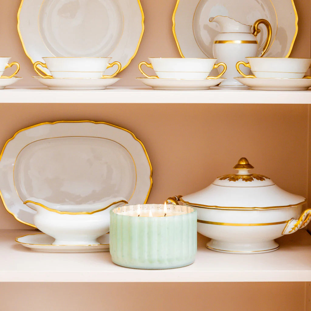White porcelain dish set with gold trim. Includes cups, saucers, and plates. Available sizes: - Cups (capacity: 6 oz and 8 oz) - Saucers (diameter: 6") - Plates (diameter: 8", 10", and 12").