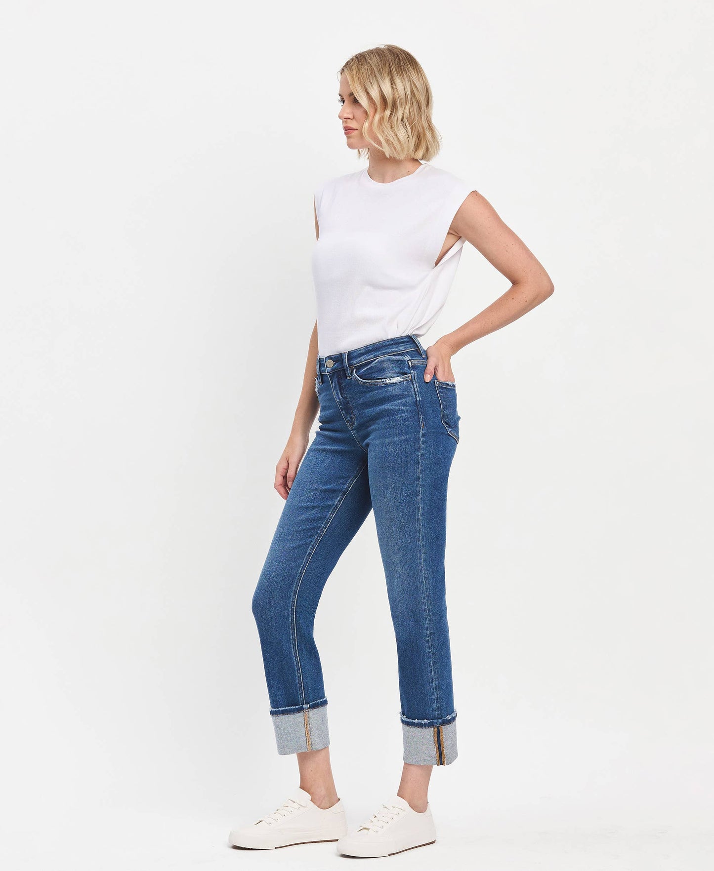 High Rise Cuffed Slim Straight Blue Jeans; available in sizes 24-32. Casual fit with cuffed hem and classic blue wash.