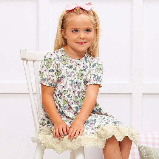 Garden Bloom Bamboo Dress with short floral sleeves. Available in sizes 2T-8Y.