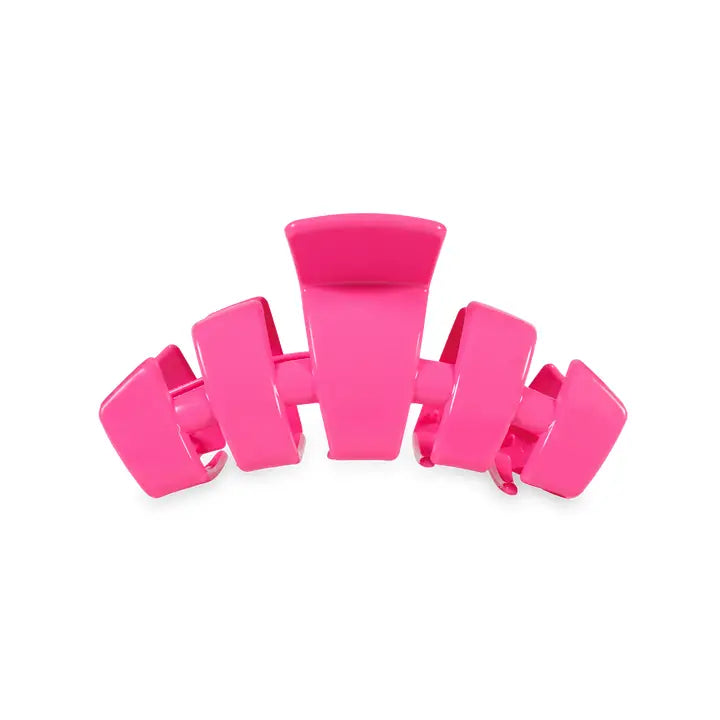TELETIES Classic Claw Hair Clip in bright pink, chunky geometric plastic. Available sizes: small, medium, large.