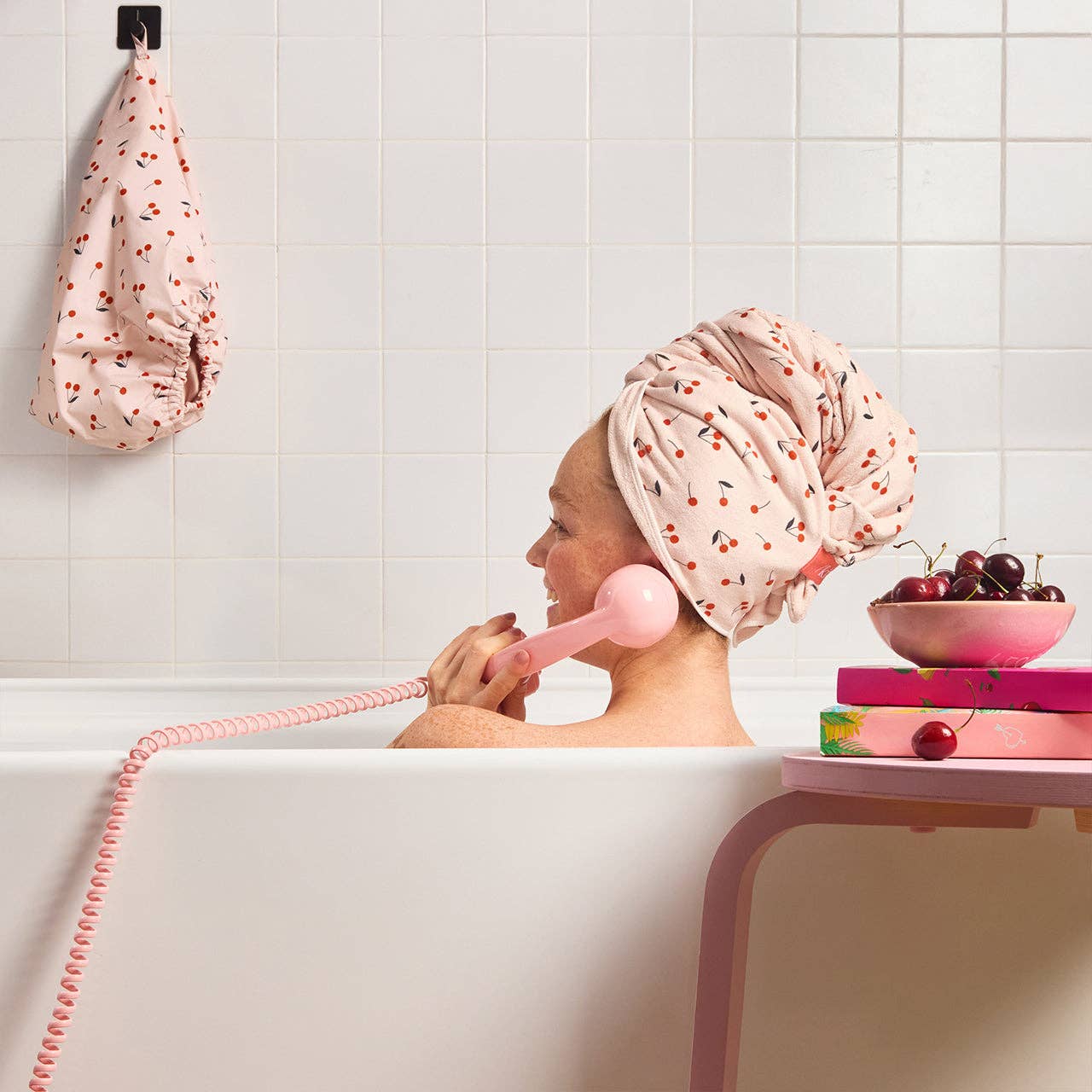 XL Hair Towel Wrap in Cherry Print shown in use; available in XL size.
