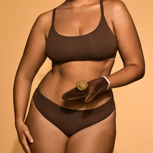 Dark Self-Tanning Mousse shown; available in 200ml and 400ml sizes.