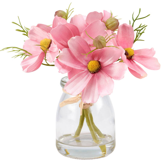 Pink Cosmos Vase with faux pink flowers, yellow centers, green stems, and raffia bow. Sizes available: small, medium, large.