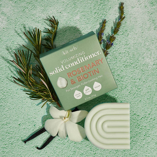 Rosemary & Biotin Volumizing Solid Conditioner in green box with matching vegan bar; available in 2oz and 4oz sizes.