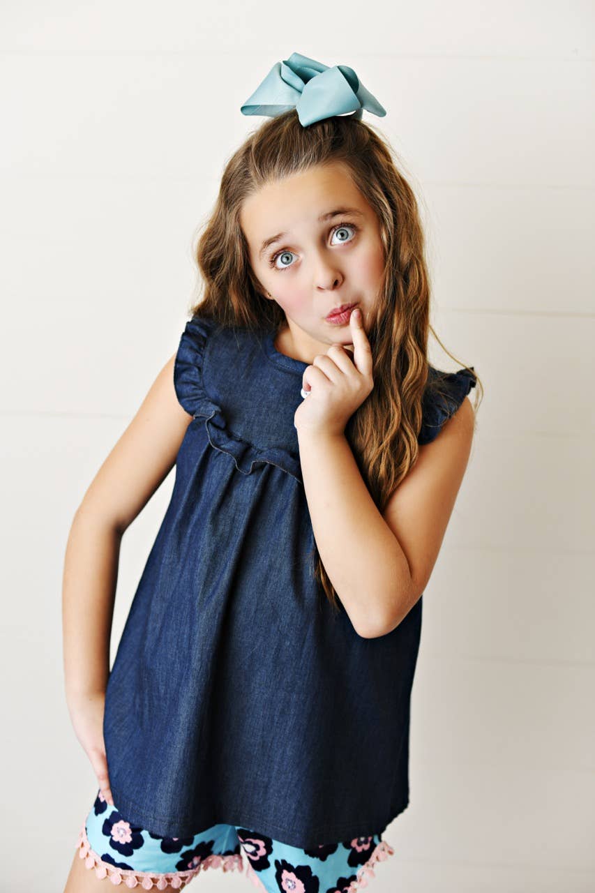 Kids Dark Jean Flower Ruffle Short Set with denim ruffle top and floral shorts. Sizes: 2T–6X.