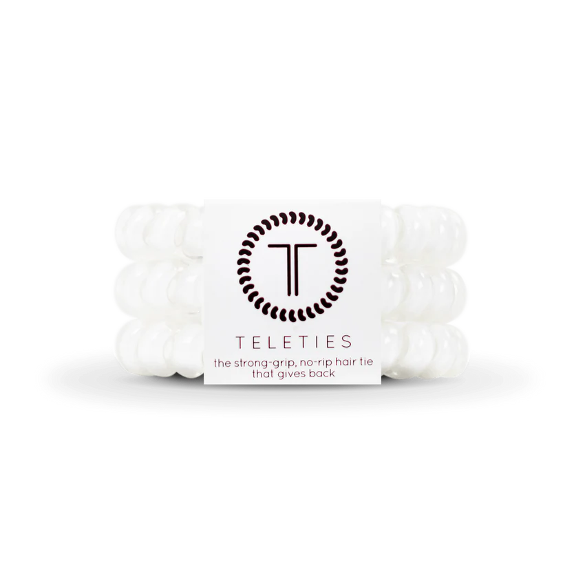 Three transparent spiral hair ties with strong grip and no-rip design. Available sizes: Small, Large.