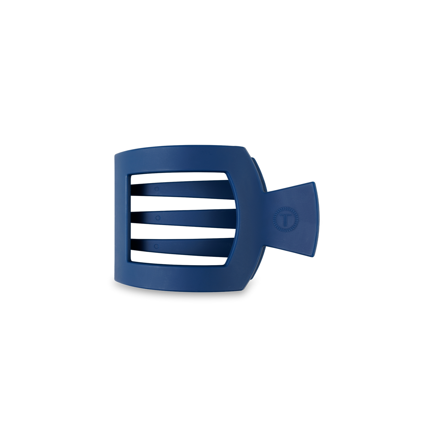 A blue, square hair clip with a strong grip, featuring three horizontal bars and a side handle. Prominent logo and text on the front. Available in small, medium, and large sizes.