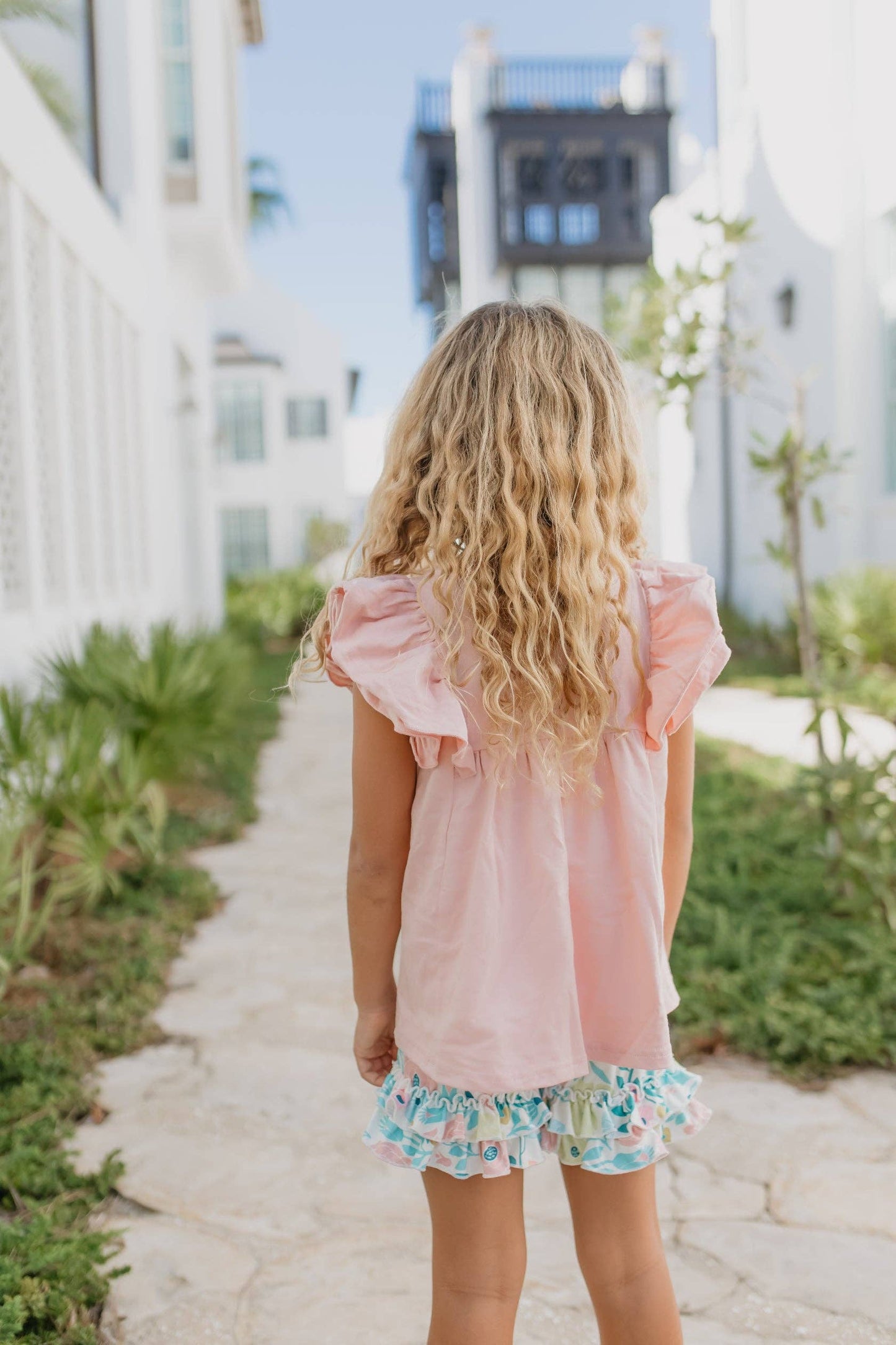 Girls Pastel Floral Ruffle Short Set; light, airy fabric; ruffled edges; spring/summer style. Sizes: 2T–8.