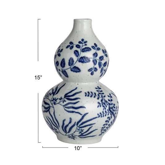 Hand-painted blue floral and leaf designs on white stoneware vase, double-gourd shape, 15"H x 10"W.