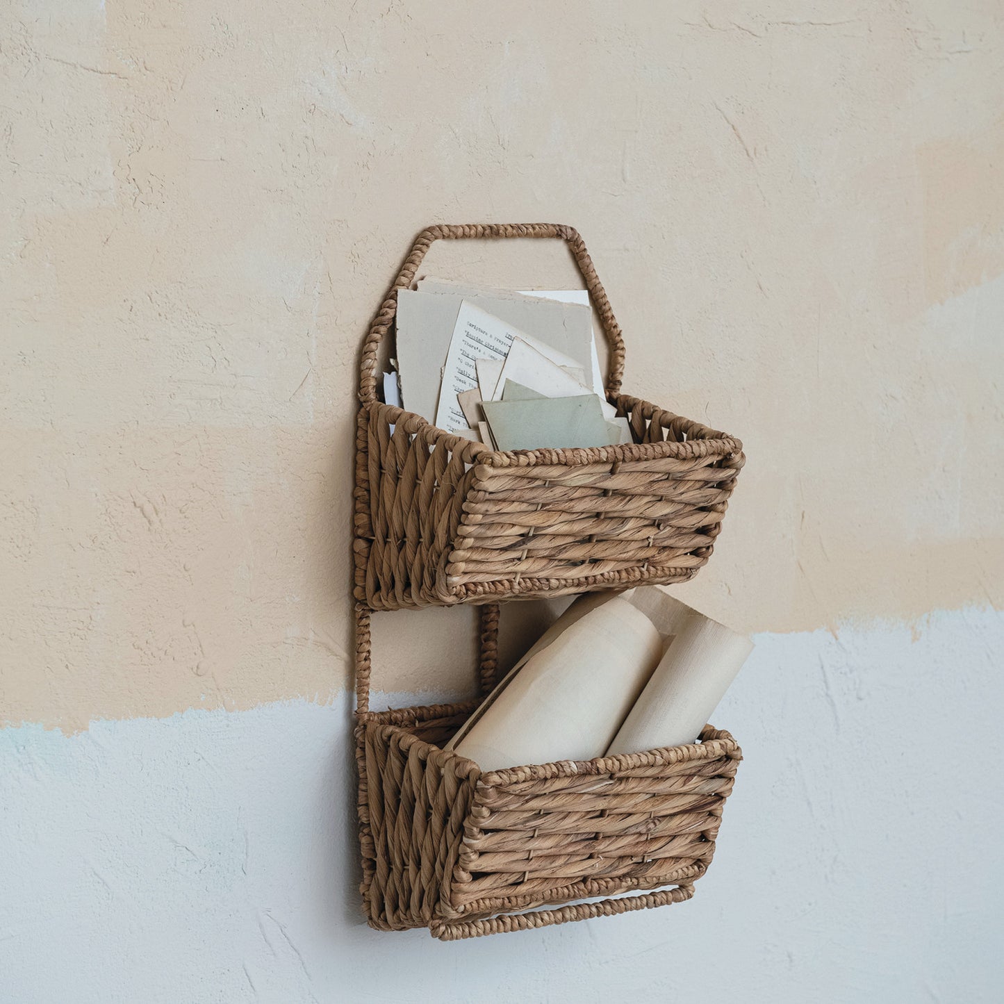 Metal & Water Hyacinth 2-Tier Wall Basket, Natural color. Dimensions: 15-3/4"W x 13"D x 14-1/2"H. Holds letters/cards on top, rolled paper below.