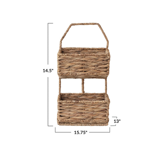 The 15-3/4"W x 13"D x 14-1/2"H Metal & Water Hyacinth 2-Tier Wall Basket offers earthy texture and a convenient handle, ideal for stylish storage or display. Available size: 15-3/4"W x 13"D x 14-1/2"H.