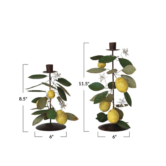 Hand-painted metal taper holder with green leaves, yellow lemons, white flowers. Sizes: 8.5" & 11.5" tall, 6" wide base.
