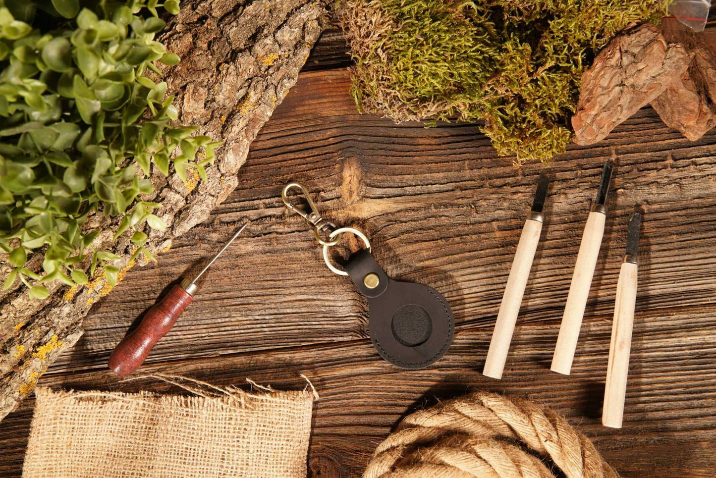 Genuine leather AirTag keychain case. Sizes available: Small, Medium, Large.