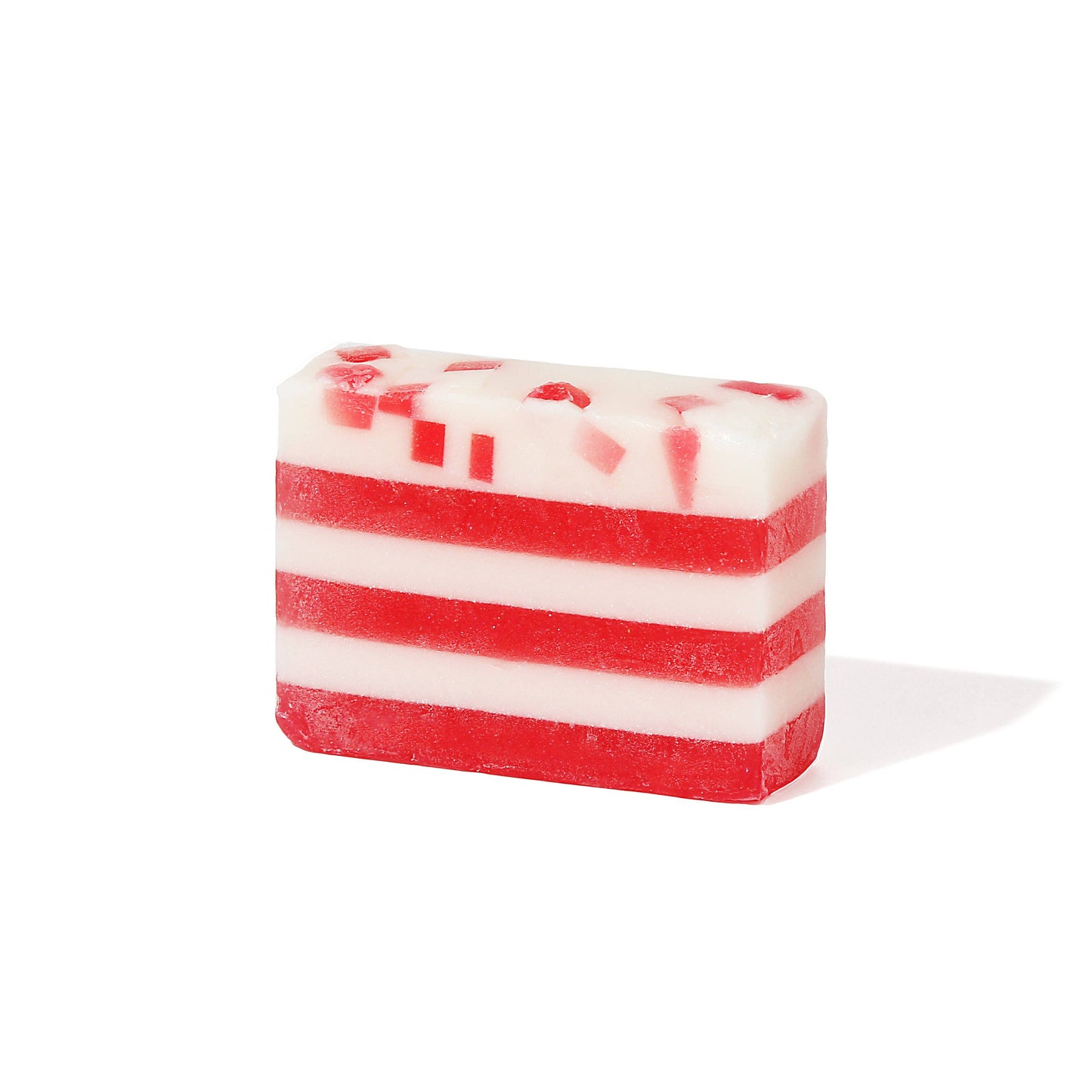 Handmade Candy Cane Bar Soap with red and white layers, red chunks on top, peppermint scent. Available in 4oz and 8oz sizes.
