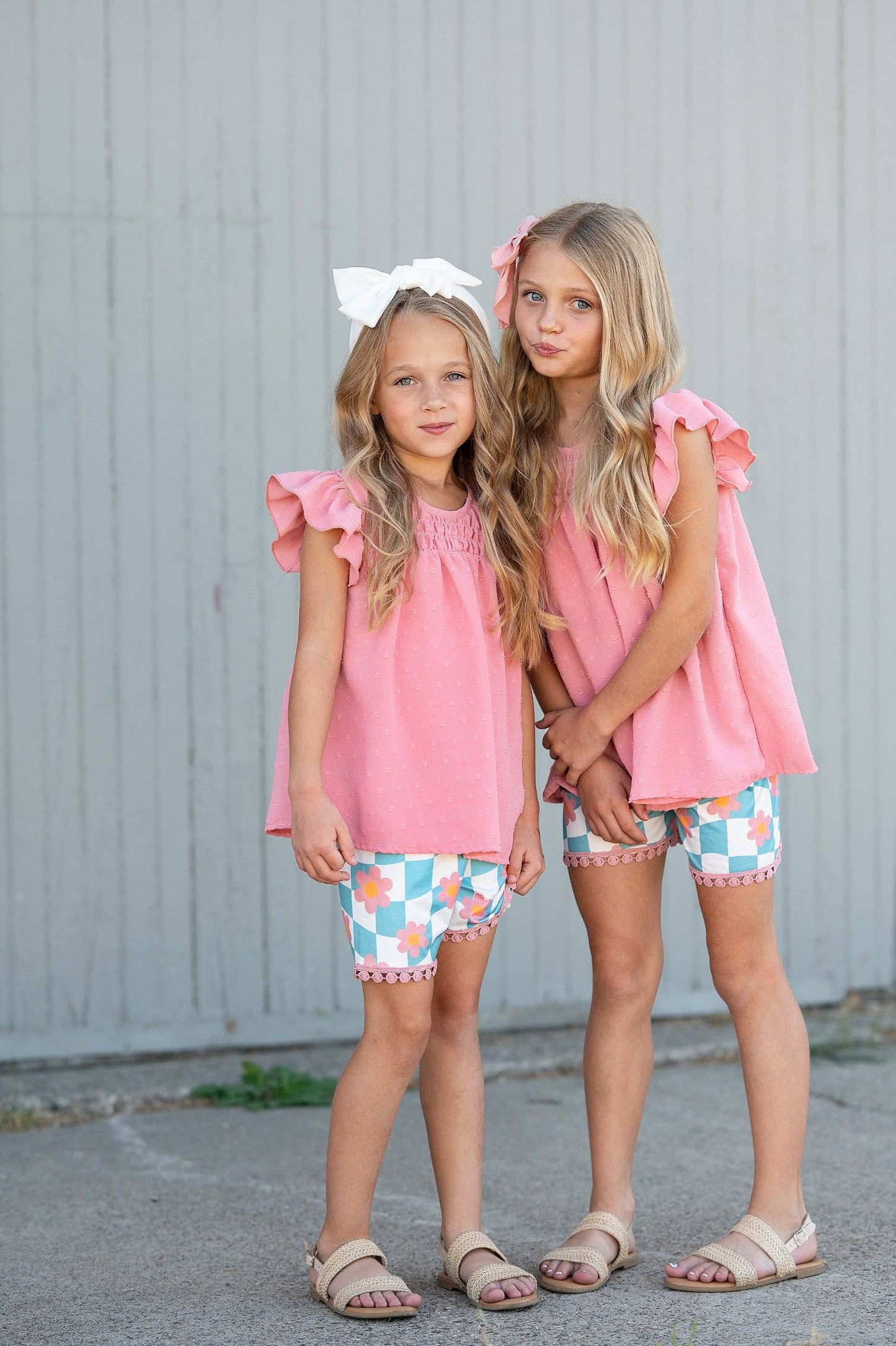 Girls Teal Check Wave Short Set; available in sizes 2T-10; features teal check pattern and wave detail.