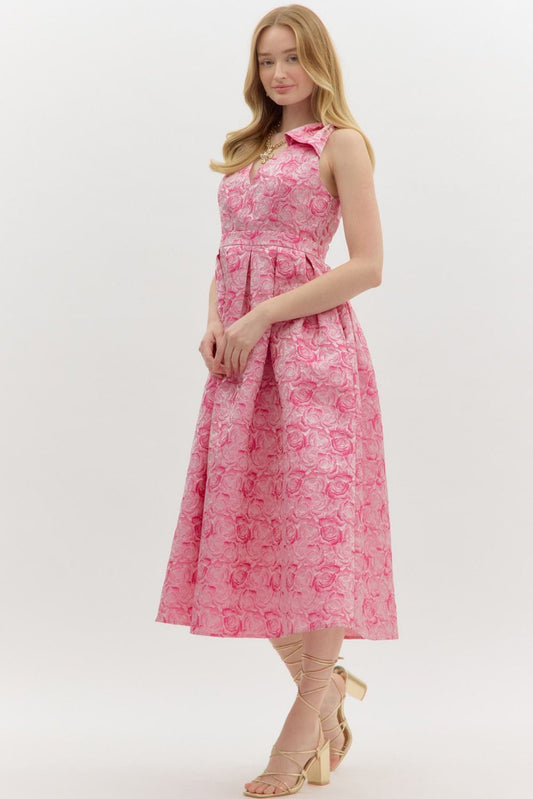 Carly Floral Print Bow Accent Midi Dress in pink floral, V-neckline, fitted bodice, flared skirt, sleeveless. Available in sizes XS-XL.