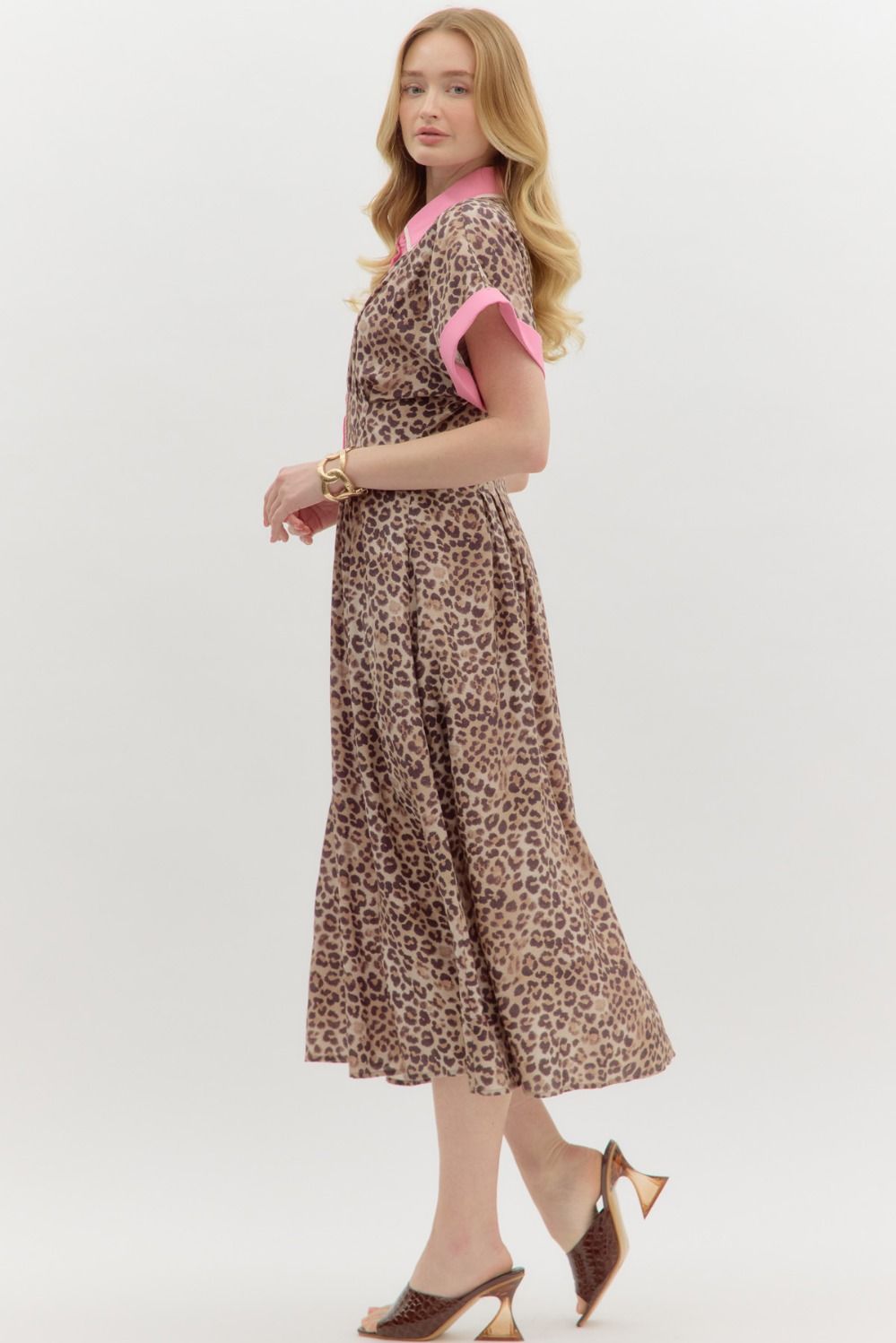 Michele Leopard Print Midi Dress with short sleeves, pink trim, and midi length. Sizes available: XS, S, M, L, XL.