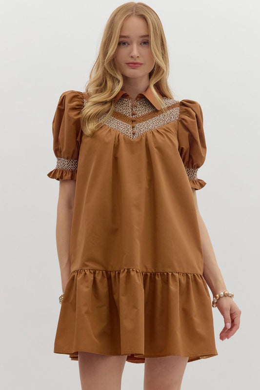 Sylvie Golden Hour Dress with loose fit, puffed sleeves, ruffled hem, chest stitching; available in XS–XL.