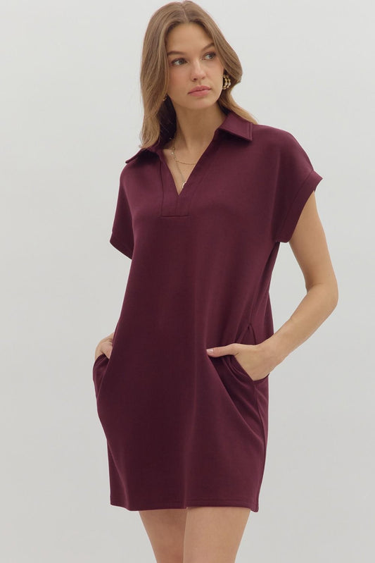 Burgundy short-sleeve collared solid V-neck pullover dress with pockets, available in sizes XS-XL.