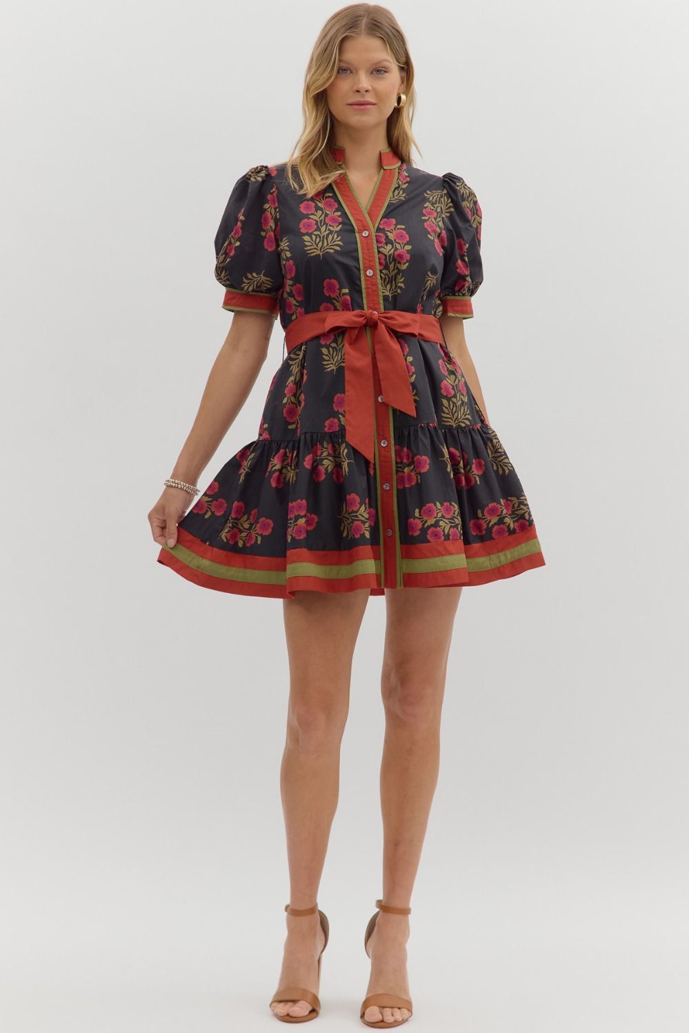 Angie Floral Puff Sleeve Ruffle Hem Dress with red embroidery and sash belt. Available in sizes XS–XL.
