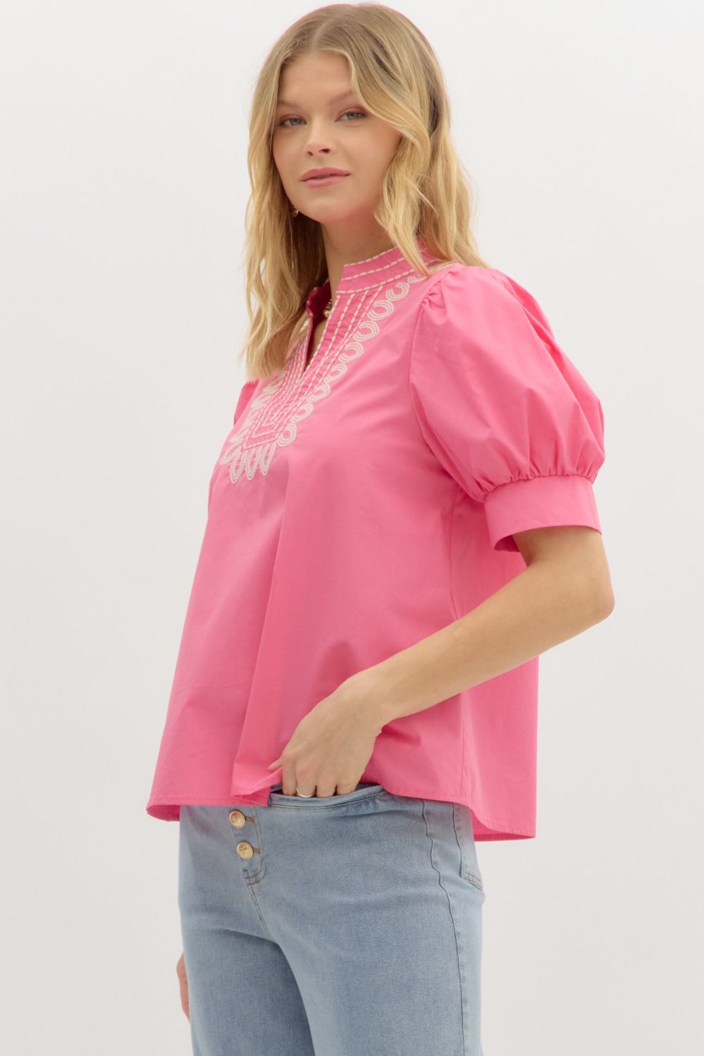 Garden Path Embroidered Top: bright pink V-neck, white embroidery, short sleeves. Available sizes: XS–XL.