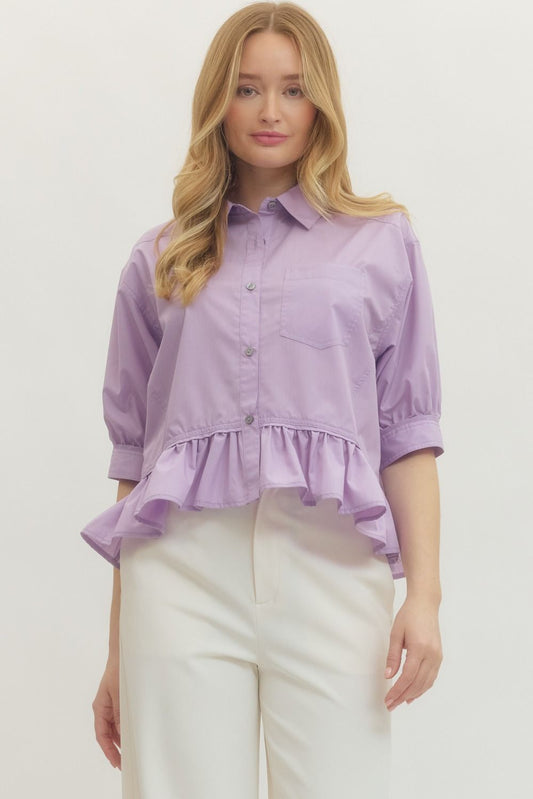 Lavender Ruffle Hem Button-Up Top with ruffle hem and buttons; available in sizes XS–XL.