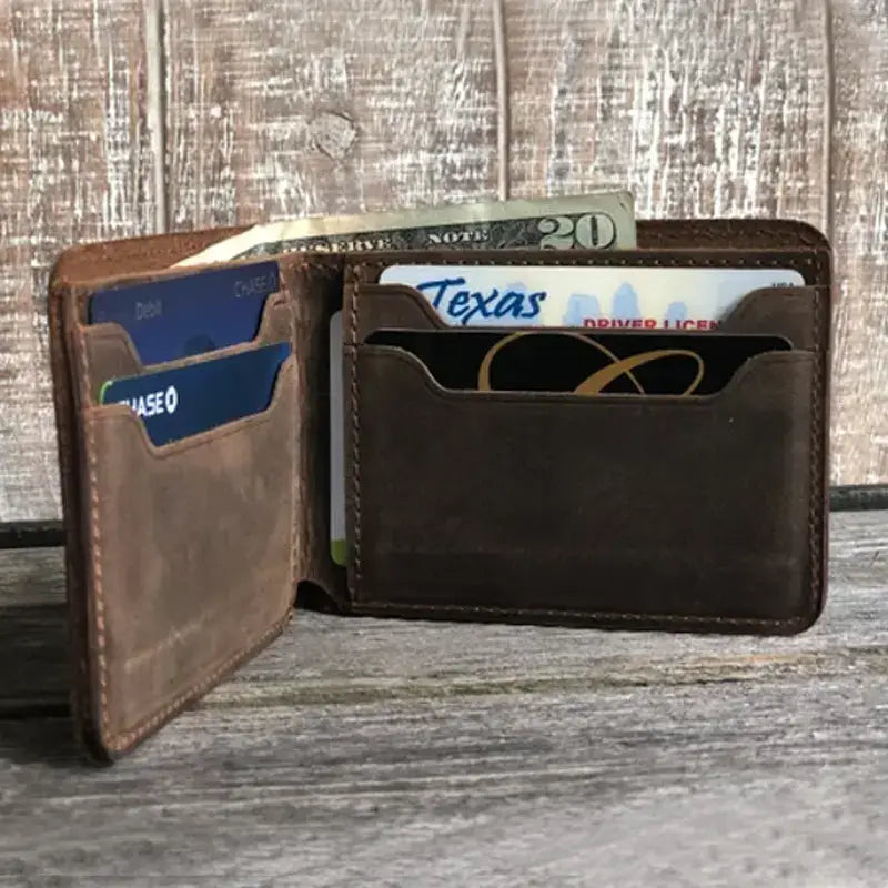 Open rustic brown handmade leather bifold wallet for men, displaying card and bill slots. Available in standard sizes.