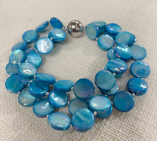 Mother of Pearl Bracelet with two strands of round iridescent blue beads and stainless magnet clasp. Available in S, M, L.