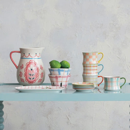 Handpainted stoneware plate with floral and checkered pattern. Available in 8", 10", and 12" sizes.